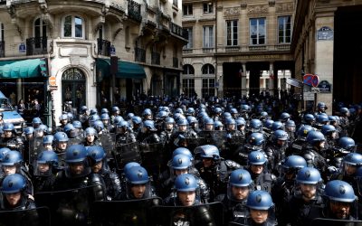 French gendarmes and CRS riot police stand in position in front of the Constitutional Council (Conseil Constitutionnel) during a demonstration as part of the 12th day of nationwide strikes and protests against French government's pension reform, in Paris, France, April 13, 2023.  REUTERS/Stephane Mahe     TPX IMAGES OF THE DAY